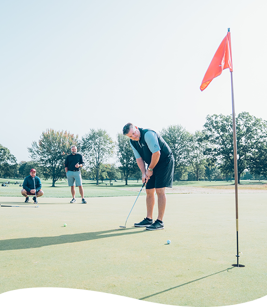 Men golfing